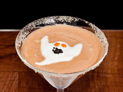 Pumpkin Martini with a Spooky Garnish for Haloween